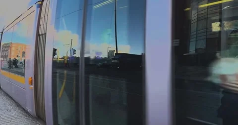 A 4K shot of an approaching Luas Tram on Harcourt St Dublin Stock Footage 256623625
