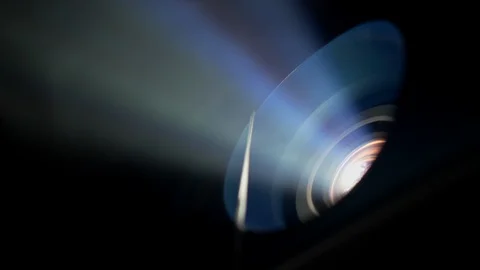 4K Shot Around Beautiful Rays Of Colours Shining Out Of Projector Surrounded  Stock Footage 122738298