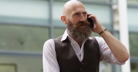 4k, Shot of a businessman using a mobile phone Stock Footage