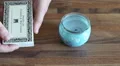 4K Shot of caucasian hands lighting scented candle with extra long match 4k or 4k+ Resolution