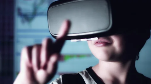 4k Shot of a Child with Virtual Reality Headset Moving Stats and Graphs Stock Footage 68344504