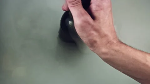 4k Shot of Cold Ice Cubes and Hand Grabbing Beer Bottle from Fog Stock Footage 67458339