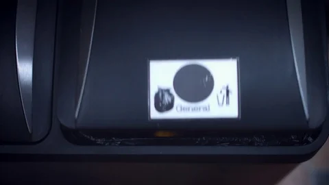 4k Shot of General Bin, Throwing to Trash remote Control for Drone Video stock 69856748