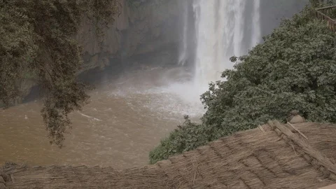 4K shot of massive Ouzoud waterfall crashing in the bottom Stock Footage 100289944