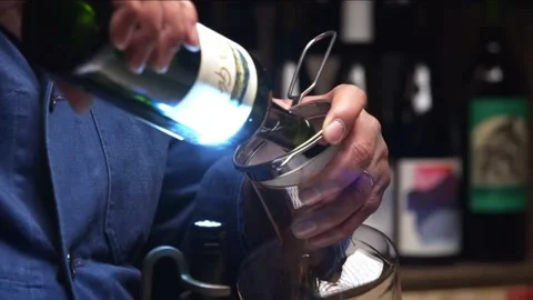 4K shot of a person serving red wine in a glass Video stock 213516641