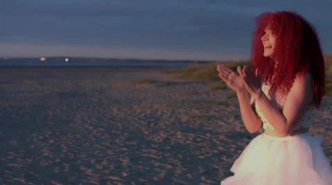 4k Shot of a Redhead Bride on the Beach Stock Footage 65446921