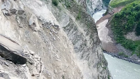 4K shot of Rocks falling from mountain due to landslide after rain in Manali Stock Footage 324700896