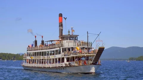 4K Shot of a steamboat returning to docks in Lake George Video stock 112284276