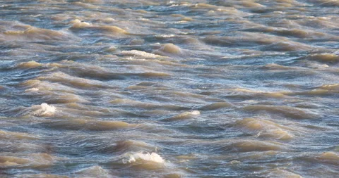 4k shot of the waves on the Danube river on a windy day Stockbeeldmateriaal 224962676