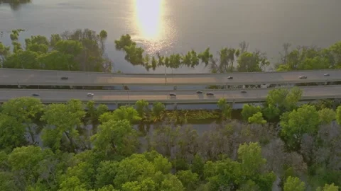 4K Side Scrolling Drone Shot Of 169 Bridge Over Fisher Lake Flooding Savage MN Stock Footage 278381042