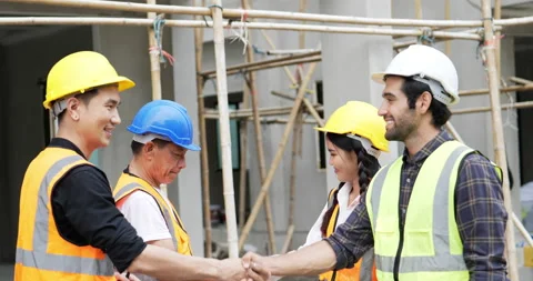 4K side view . Civil engineer shakes hands Stock Footage 194765344