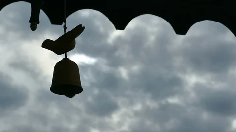 4K silhouette bell on blue cloud rainny sky. Abstract sadness moment Vídeos de archivo 99496137