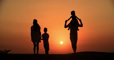 4k silhouette of a family, father mother... | Stock Video | Pond5