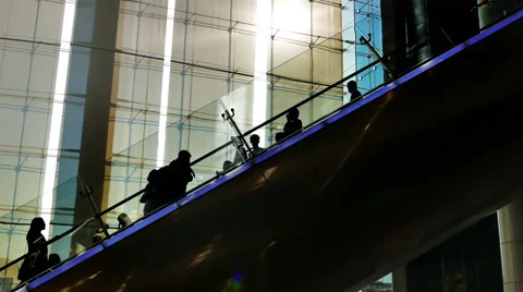 4k Silhouette People using Escalator. Stock Footage 62853569