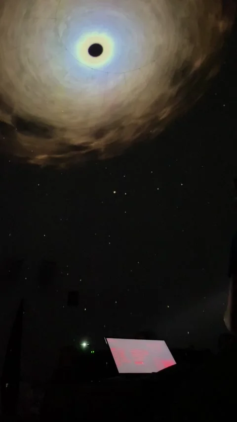 4K, a simulating of black hole projecting in a dome Video stock 253425296