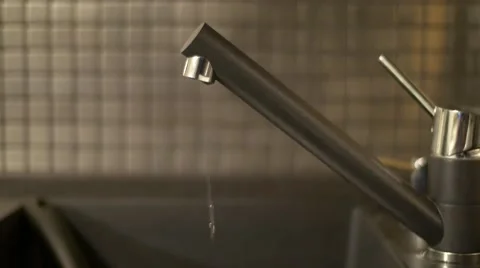 4k Sink dripping leaky kitchen faucet wasting water Stock Footage 59139174