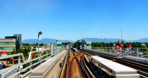 4K Skytrain Rolls up and Stops at Train Station Stock Footage 51961805