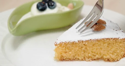 4K - Slice of almond cake Stock Footage 108052132