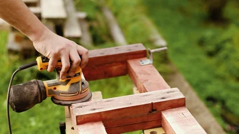 4K slow motion 60 fps footage of a craftsman hand using an electric orbital s Видео 346069430