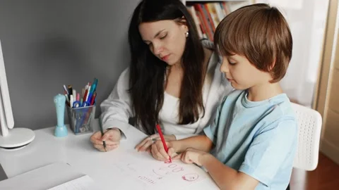 4K slow motion 60fps footage of a caring caucasian mother helping her young s Video stock 346069222