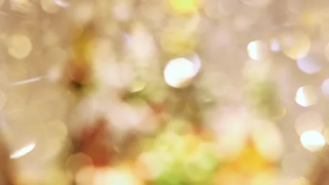 4K slow motion of abstract golden bokeh light leaks on a blurred background. Stock Footage 345525009