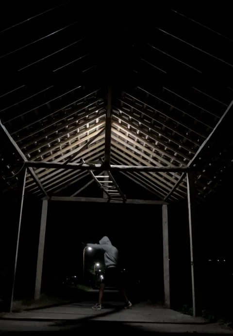4K Slow Motion An Athlete Wearing A Hoodie Is Doing Shadow Boxing Training  库存影片 337227361