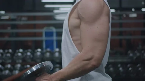 4k Slow Motion Athlete Working Out with Dumbbells Weights in Gym Stock Footage 185160625