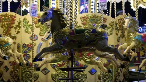 4K: Slow-Motion Carousel Galloper Horses at Night Stock Footage 256984985