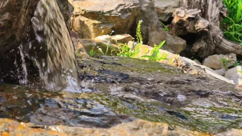 4K slow motion Cinematic B-roll footage waterfall cascades rocky stream. Stock Footage 311590300
