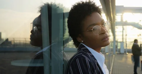 4k. Slow motion. Close-up of charming serious African American woman in glasses Stock Footage 98304426