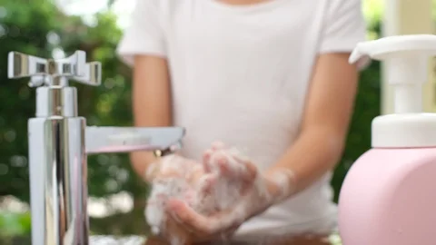 4k slow motion close up, kid hand use bubble soap to wash hand Stock Footage 125896027