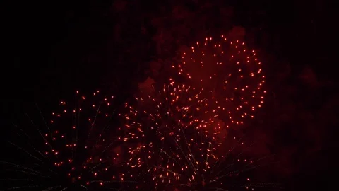 4K Slow-motion - close-up of real fireworks in the night sky background. Stock Footage 128242060