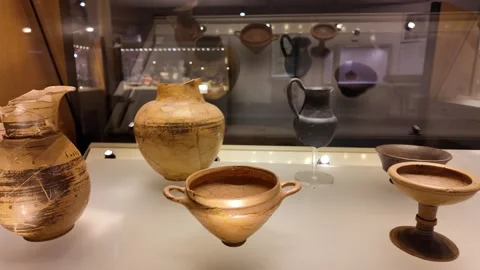 4K Slow Motion Detail Of Ancient Roman Bronze And Glassware Museum Video stock 332873379
