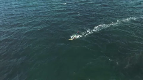 4k slow motion drone shot of windsurfer ... | Stock Video | Pond5