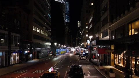 4k slow motion. Low angle aerial drone shot of New York City street at night NYC Stock Footage 122549061