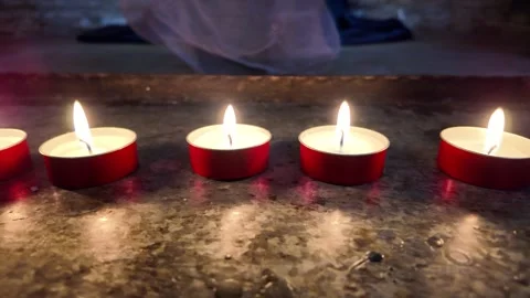 4K Slow Motion Macro Of Flickering Church Candles Stock Footage 333917976