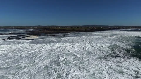 4K Slow Motion Ocean Surf Along Rocky Coast Stock Footage 333704238