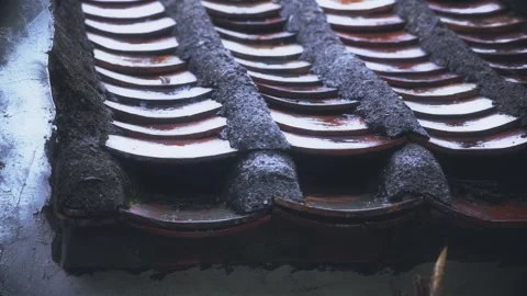 4K Slow Motion of Old House Eaves Dripping Water on Rainy Day Stock Footage 338002954
