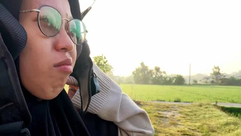 4K Slow Motion Portrait of a Young Woman Wearing a Stylish Motorcycle Helmet Видео 338171039