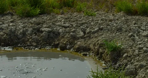 4K Slow motion RED EPIC, image of water bubbles coming out of a spring Stock Footage 106932341