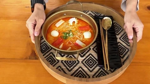 4K Slow Motion: Serving Steaming Hot Spicy Tom Yum Soup in Traditional Stock Footage 338278849