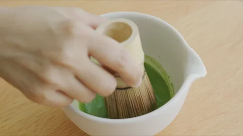 4K Slow motion shot relaxing weekend lifestyle, making homemade matcha Stock Footage 341170296