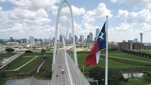 4K Slow Motion Texas Flag Aerial Dallas Skyline Sunrise Stock Footage 95824471