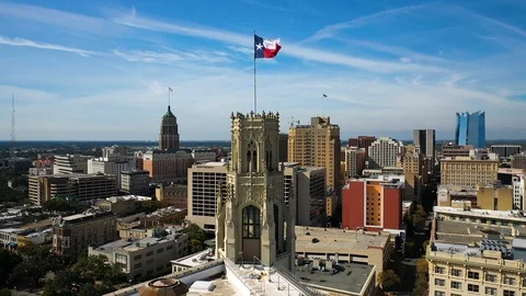 4K Slow Motion Texas Flag Waving in Wind Orbit Drone San Antonio Summer Day Stock Footage 119722282