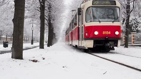 4K Slow Motion Tram in Prague  with heavy snow during 2021 winter Stock Footage 147374737