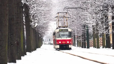 4K Slow Motion Tram in Prague in snow during winter Stock Footage 147375305