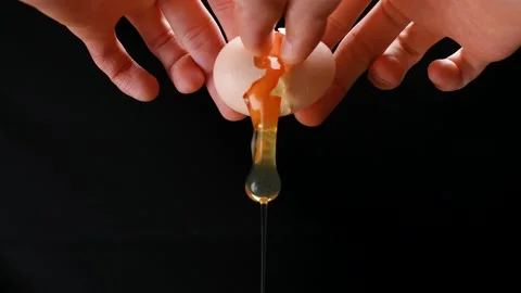 4K slow motion video of breaking an egg. Video stock 226903563
