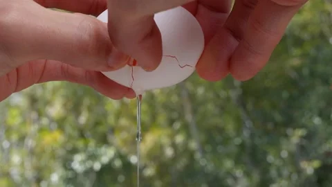 4K slow motion video of breaking an egg. Stock Footage 236086052