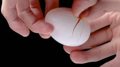 4K slow motion video of breaking an egg. Stock Footage 302445762