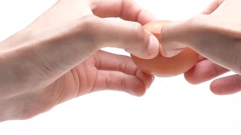 4K slow motion video of breaking an egg. Stock-Footage 333285076